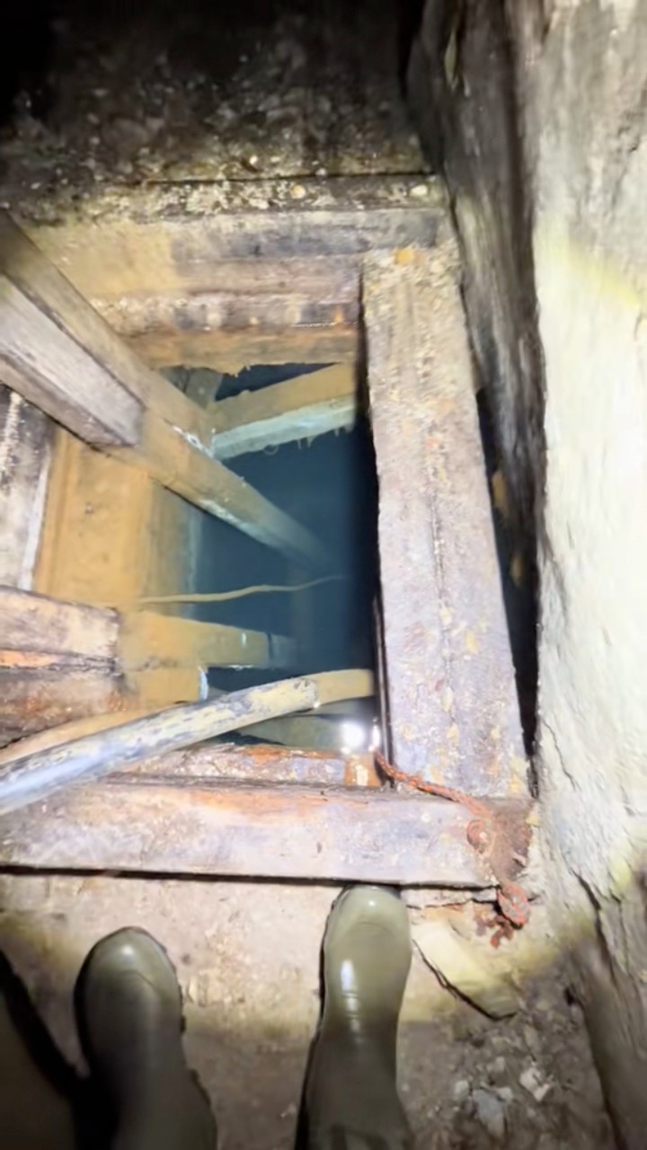 Inside the lower adit I found a flooded winze with air tugger still at ...
