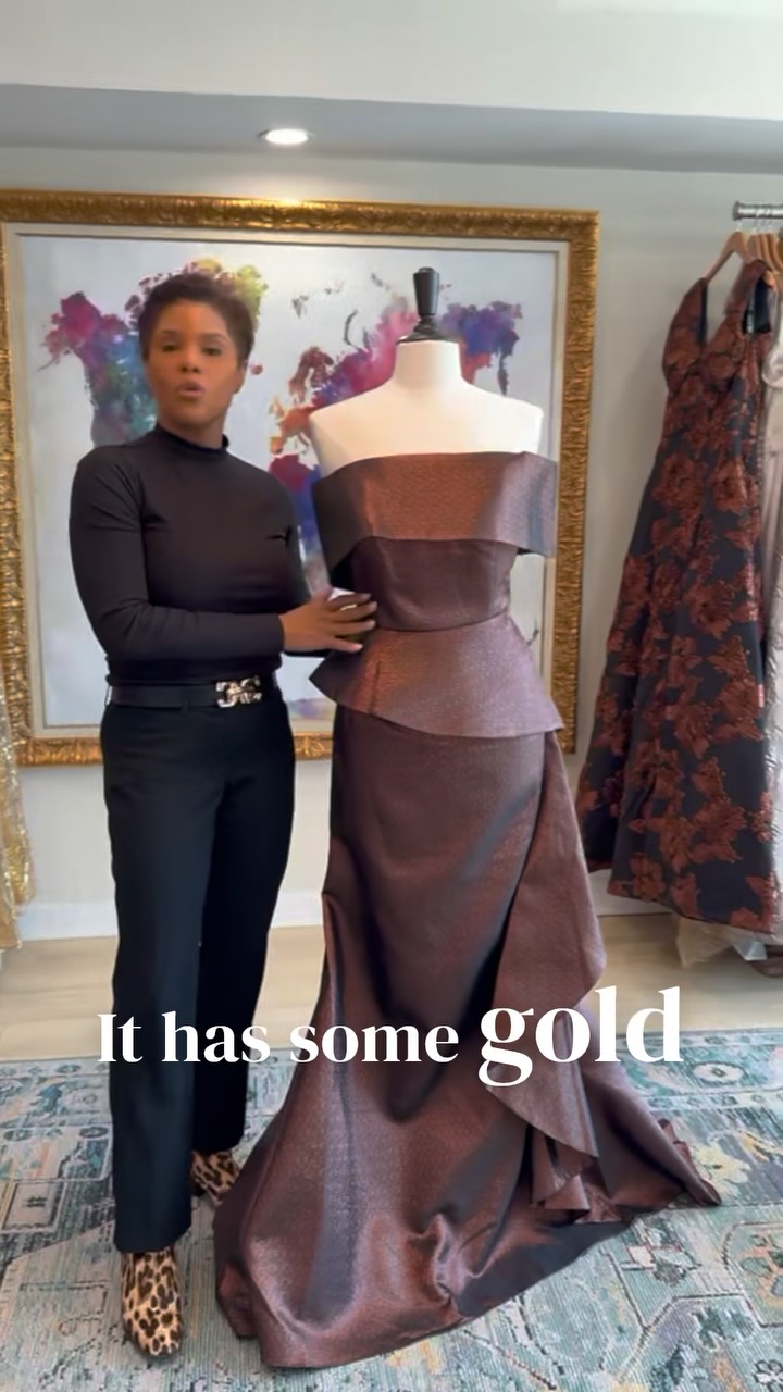 formal dresses st charles mo Coffee colors are having a moment, and this espresso gown is absolutely stunning. ☕✨, The gold shimmer, rich draping, and dramatic portrait collar give you that beautiful off-the-shoulder look with Charmi creations