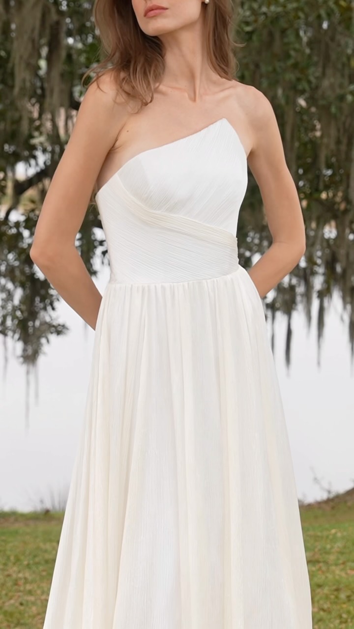 Meet our newest arrival from Anne Barge Harelston ✨ , From the designer: “The Harelston gown is an A-line Crinkle Chiffon gown with softly gathered skirt and an asymmetrically pleated strapless bodice 