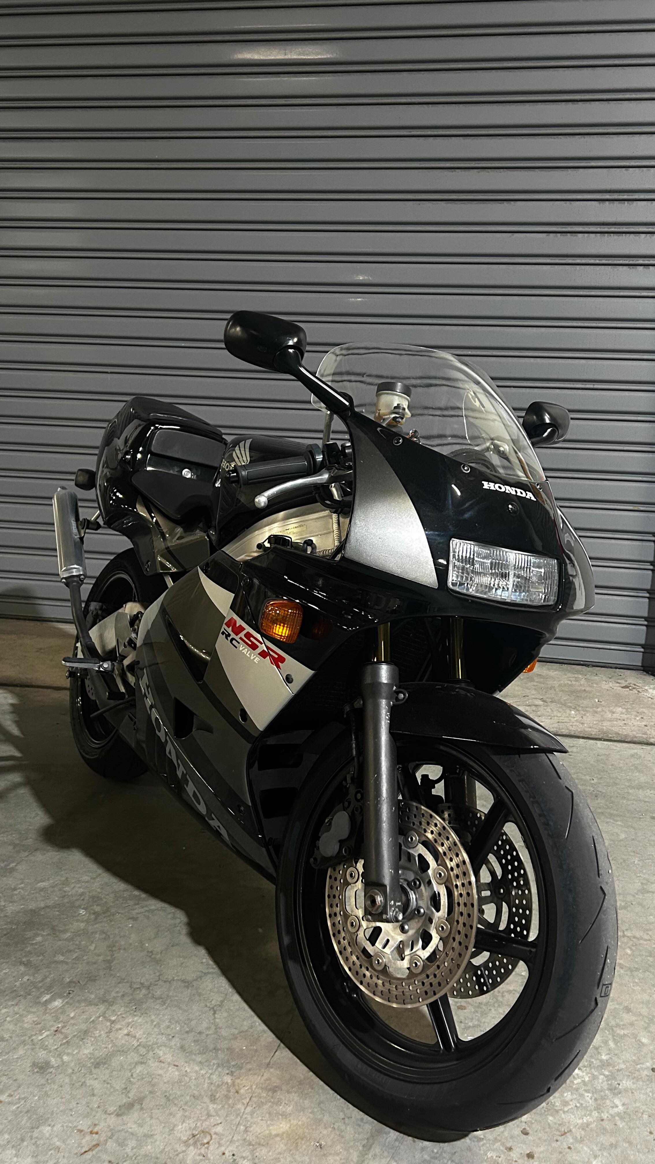 The Honda NSR250R is a legendary 2-stroke sportbike, featuring a