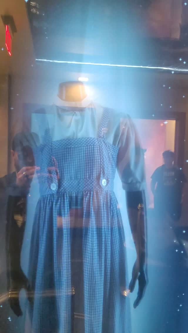 The coolest thing I saw all week! 💙✨, The actual, original dress Judy Garland wore as Dorothy in The Wizard of Oz! 👠🌈, Seeing an authentic piece of movie history like this up close was absolutely 