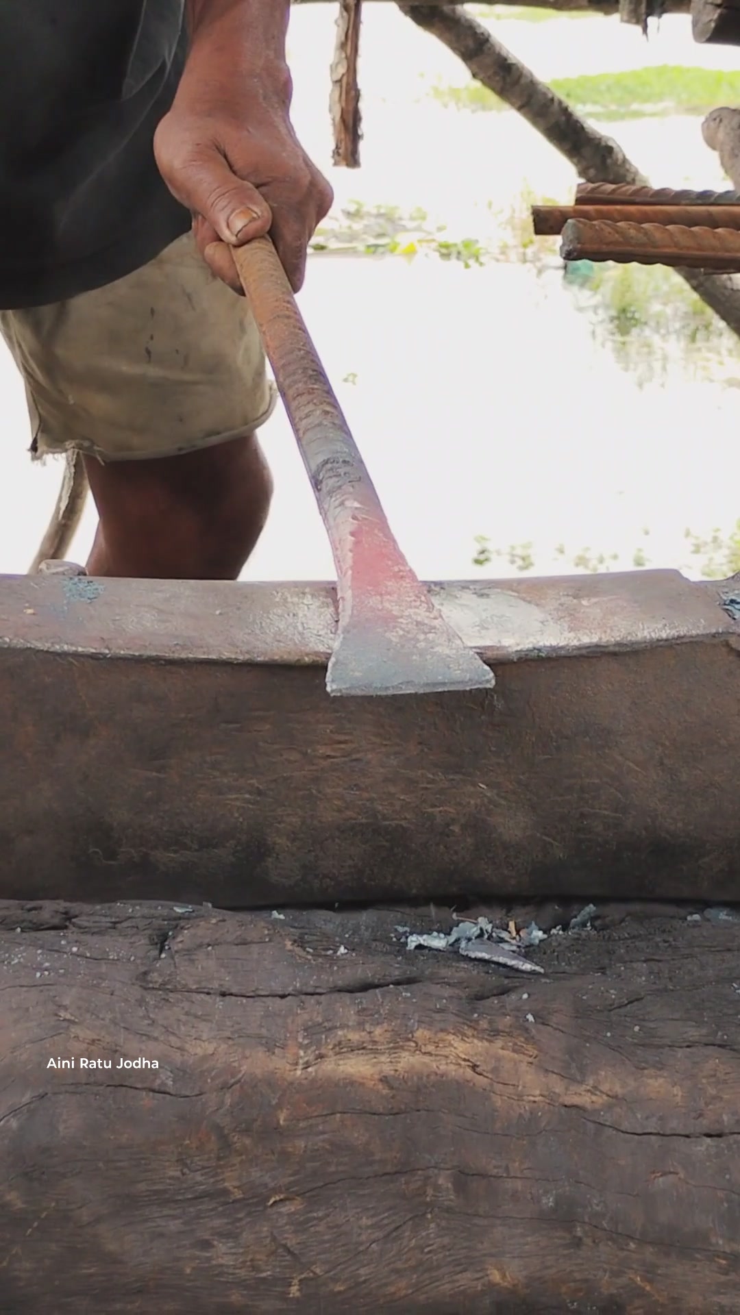 technique for cutting the tip of a crowbar/earth digging tool. # ...