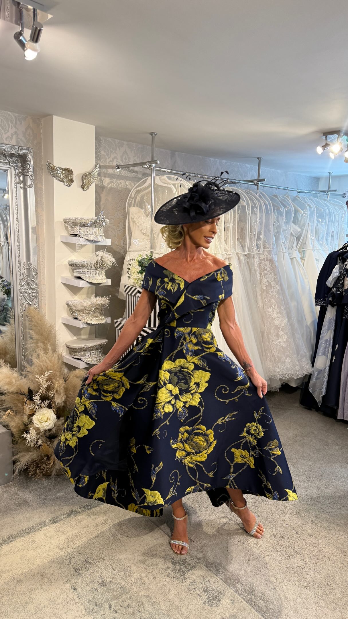 💛 NOW THIS IS A SHOWSTOPPER… 💛, Introducing Gabriela Sanchez 26401 — and what an entrance she makes! ✨, A breathtaking navy occasion dress adorned with dramatic golden floral detailing, creating the 
