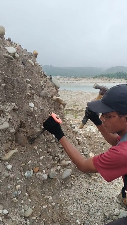 Digging up $999 worth of rocks, on a cliff from a former gold mine. # ...