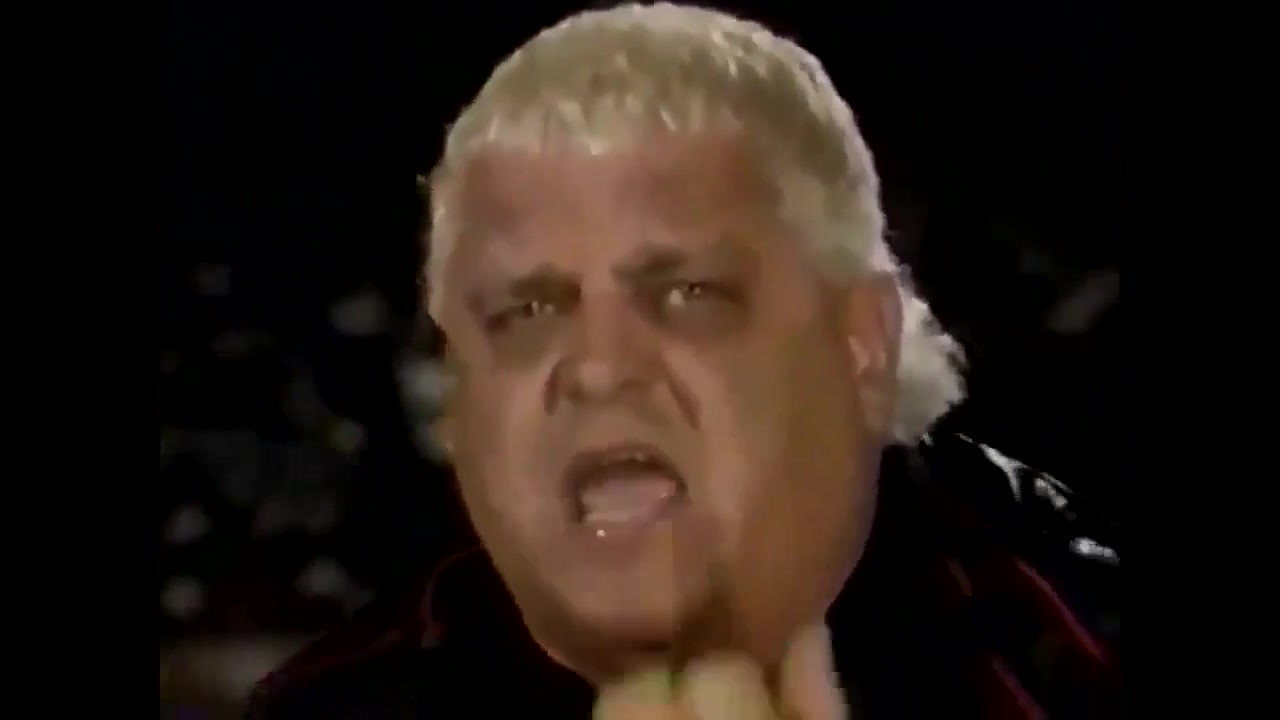 12/30/90: Mean Gene is with Dusty & Dustin Rhodes. Dustin is doing an ...