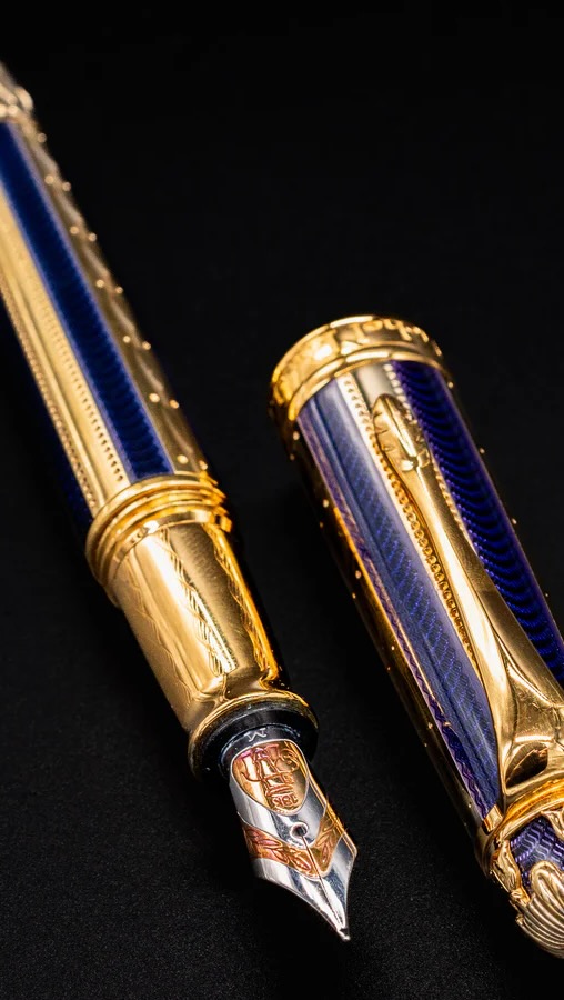 The Michel Perchin Fabergé Ribbed Blue & Gold Fountain Pen is a