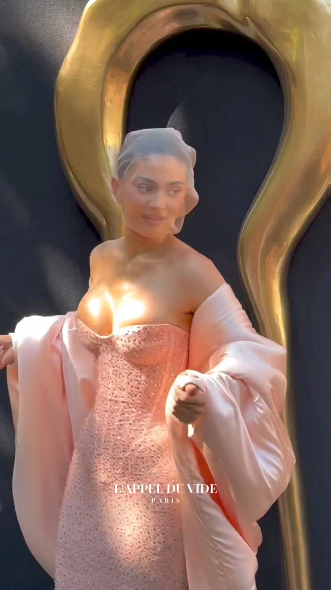 kylie jenner gold dress designer wore a custom ASHI STUDIO Couture gown to the 83rd Annual Golden Globe Awards Ceremony. The look features a sculpted, molded strapless corset precisely shaped to the body, kylie jenner evening gowns