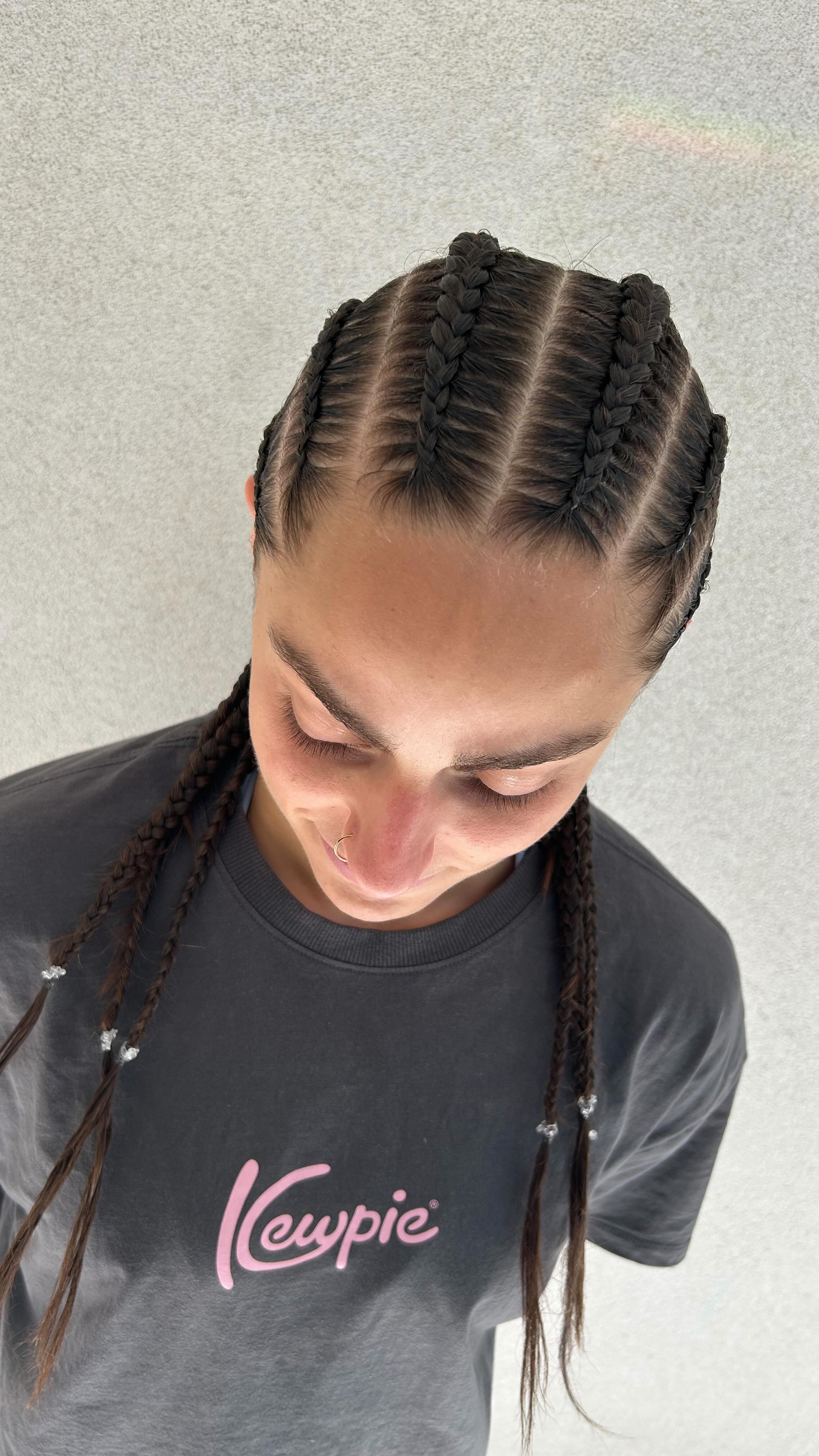 Cornrows for Amanda ahead of her fight 🥊 Even with extensions braids ...