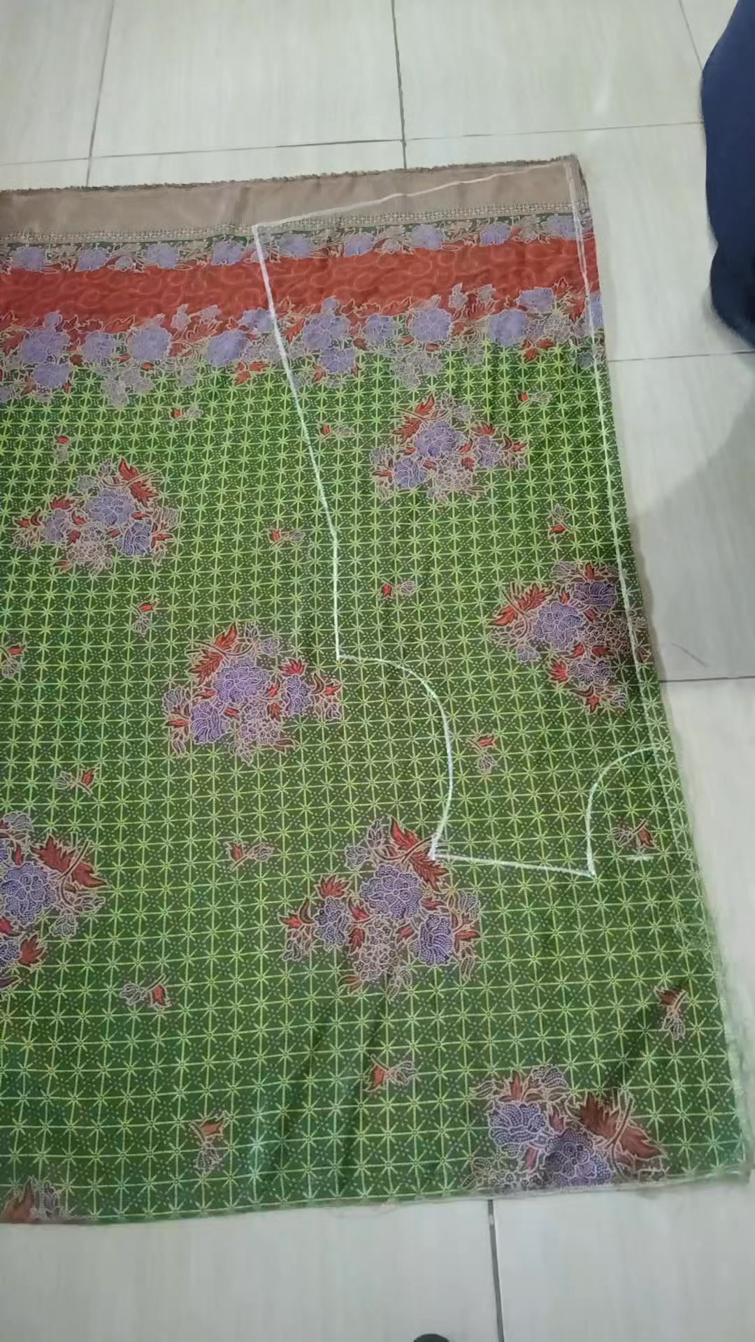 Cutting the batik fabric for the front body pattern