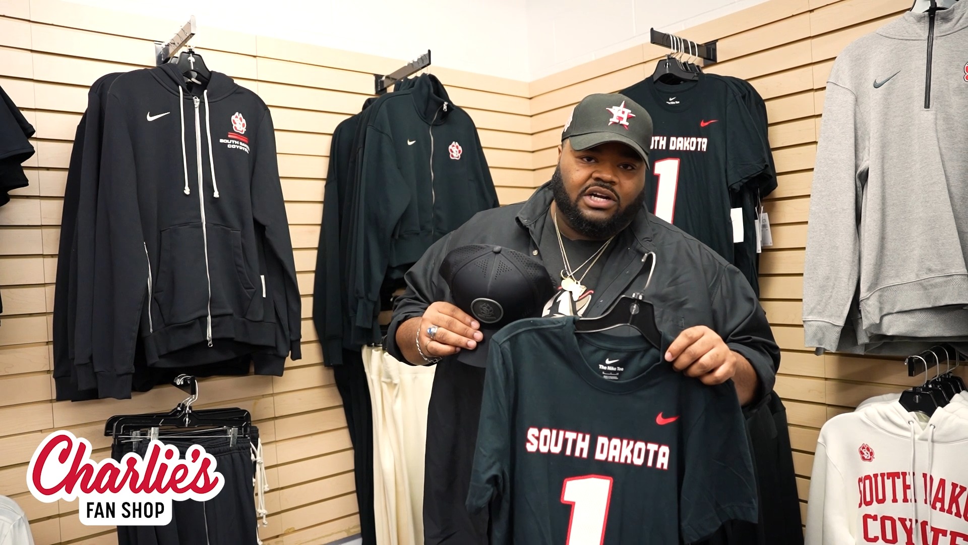 If you haven't heard, the dress code for the South Dakota Football game is black 👀, Run to USD Charlie's Fan Shop and grab this combo for $10 off to wear for Saturday's game! , 🔗: usdcharliestore.com, 