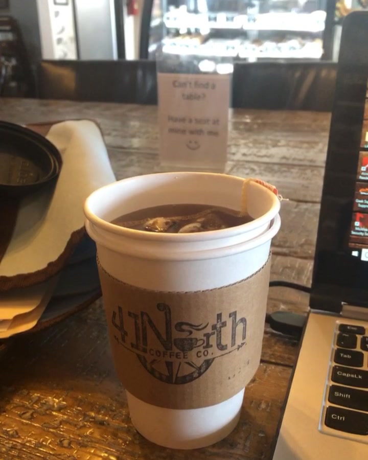 Nice cozy chairs, free WiFi + your... 41 North Coffee Co.