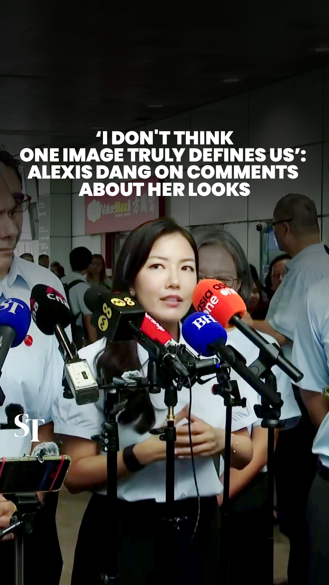 alexis dang blue dress #WP's shared her thoughts on receiving comments about her appearance on the #GE2025 campaign trail. | The Straits Times alexis dang singapore