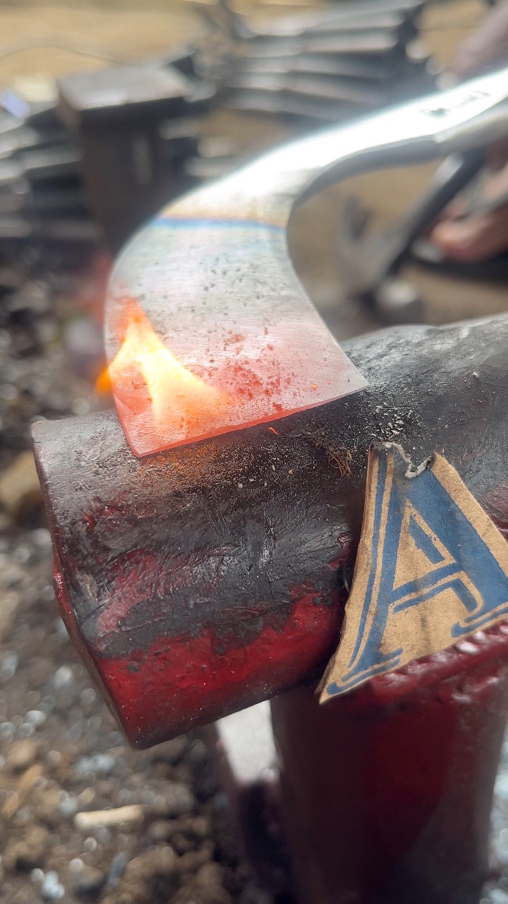 forming the blade of a rubber tapping chisel, accompanied by a musical ...
