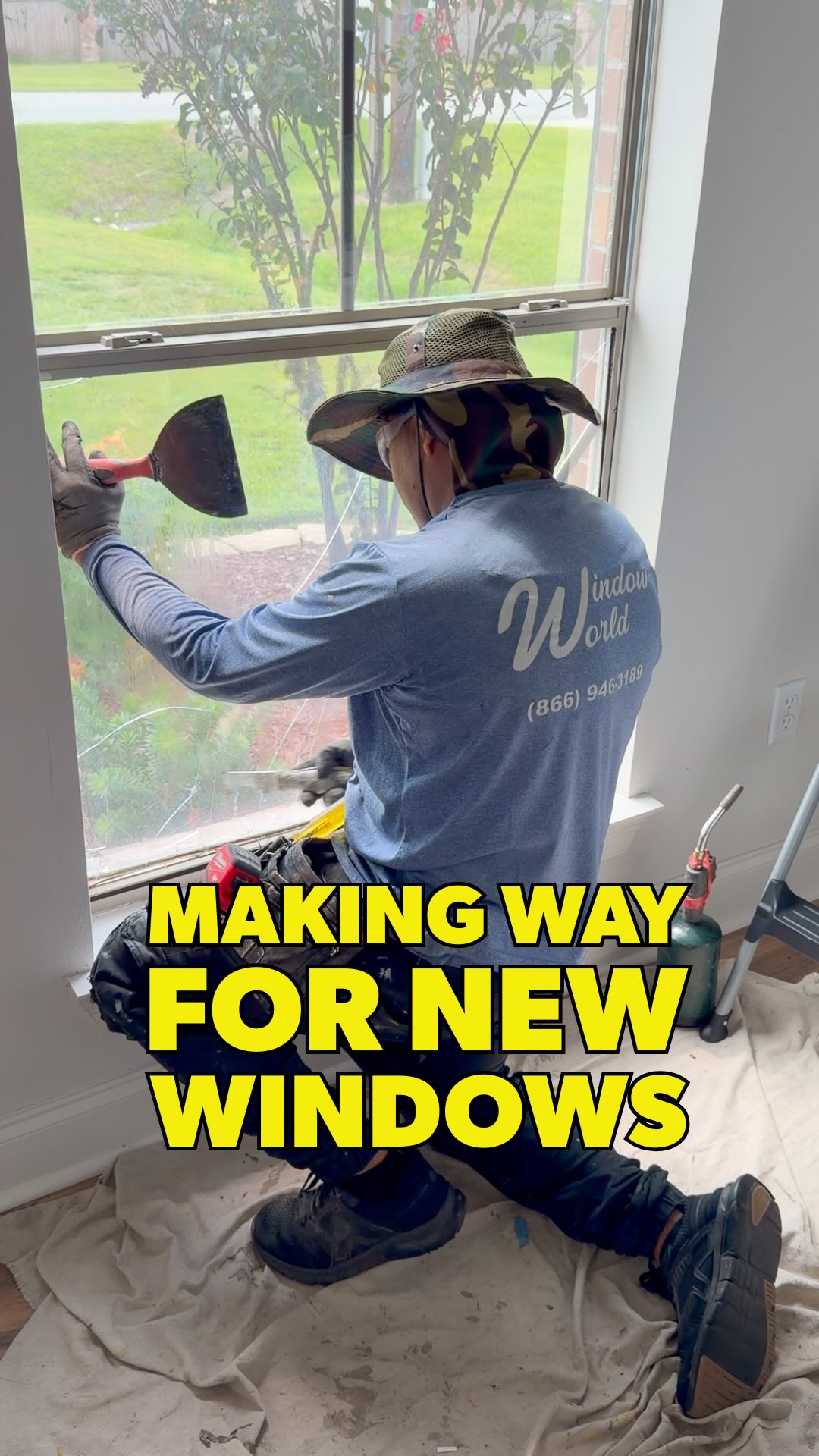Removing the old glass to make way for brand-new, energy-efficient ...