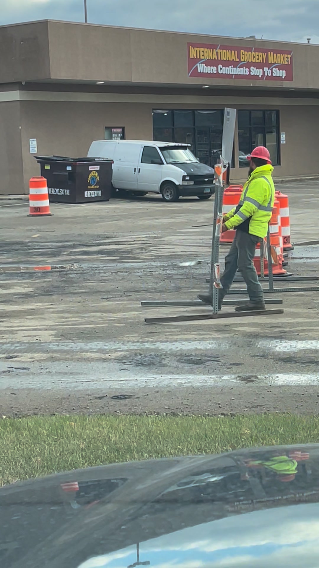 Final cleanup work is under way in the intersection of Mall Loop Road ...
