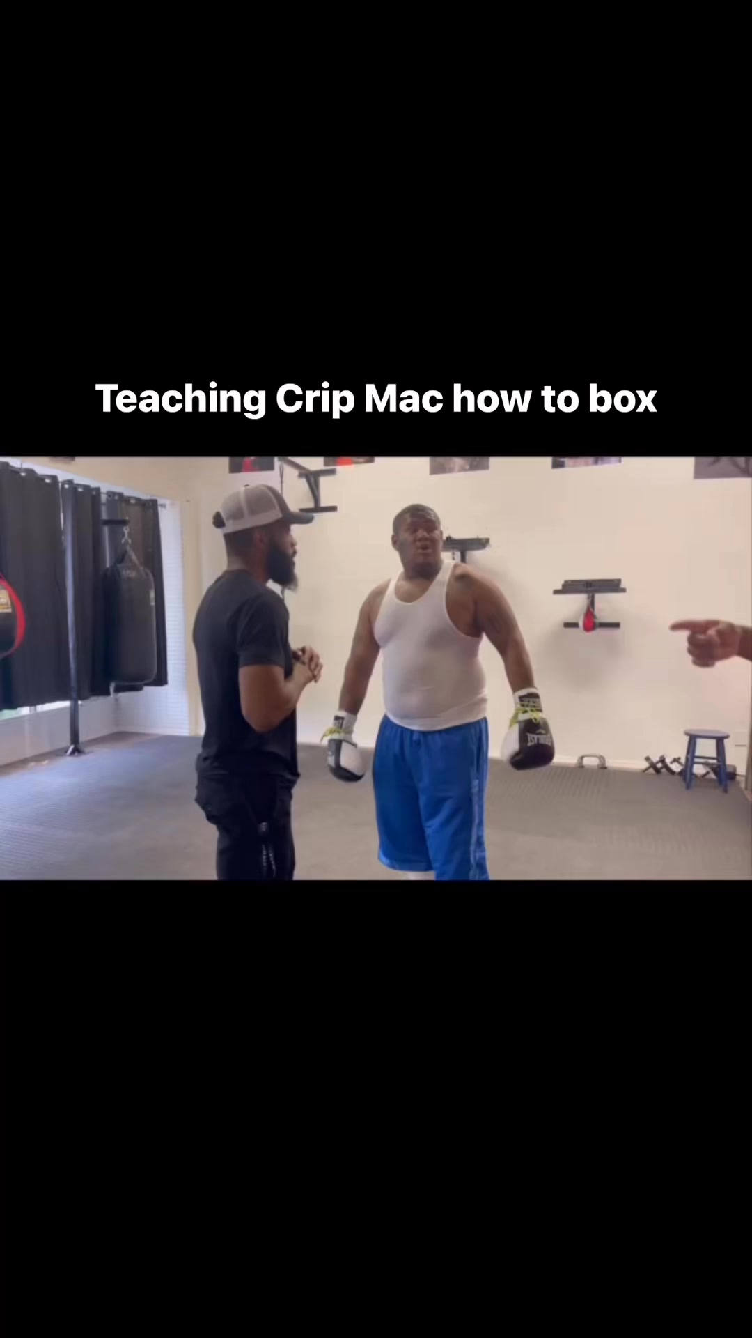 Coach Staff teaching Crip Mac how to box | Andrew Stafford | Facebook
