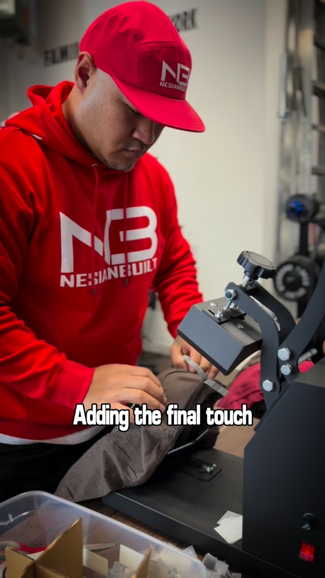 That final touch before it becomes YOUR new favorite workout tee🫡 ⚔️ ...