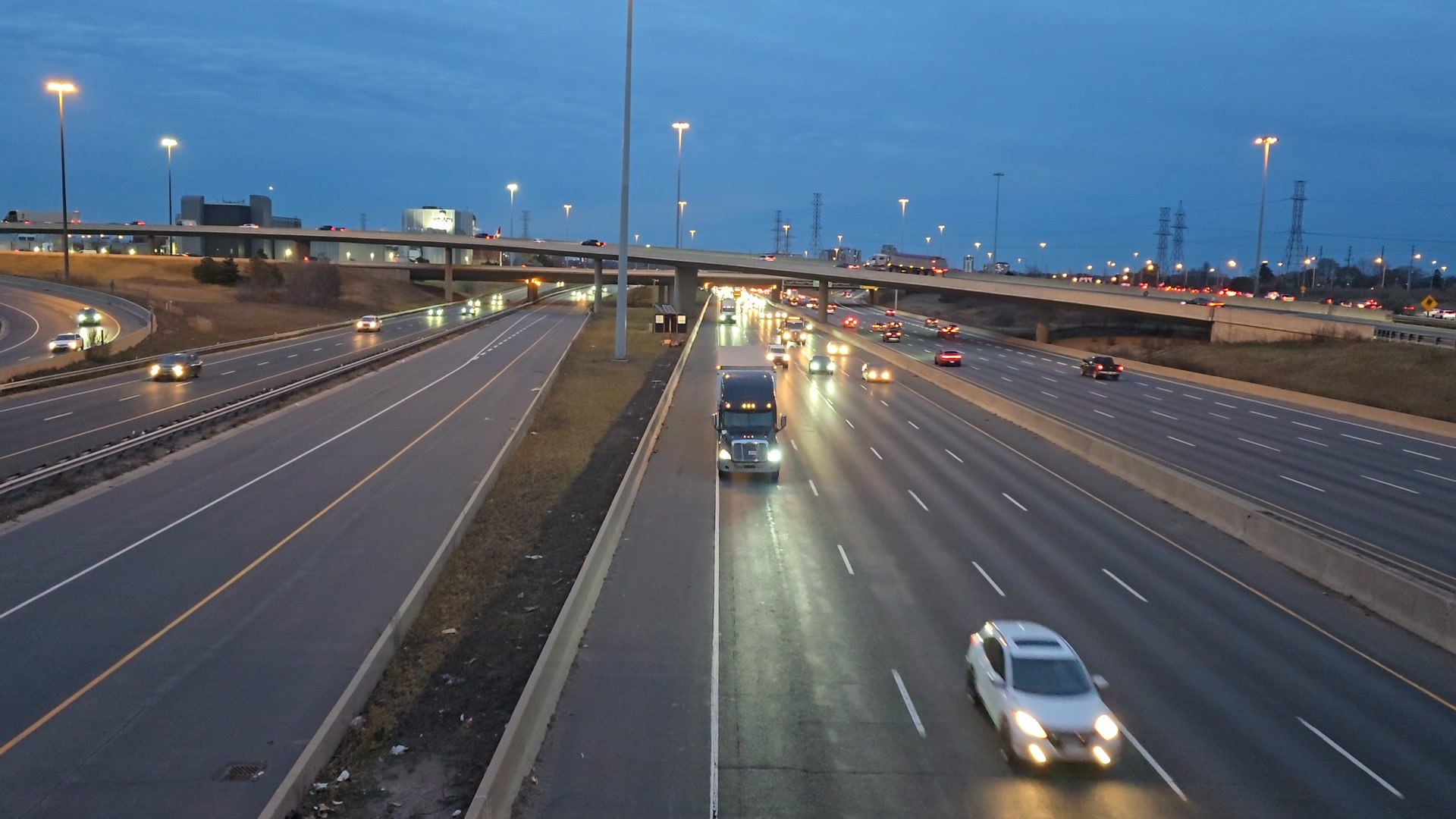 Night traffic on the 16 lanes of highway 401 toronto canada by renforth ...