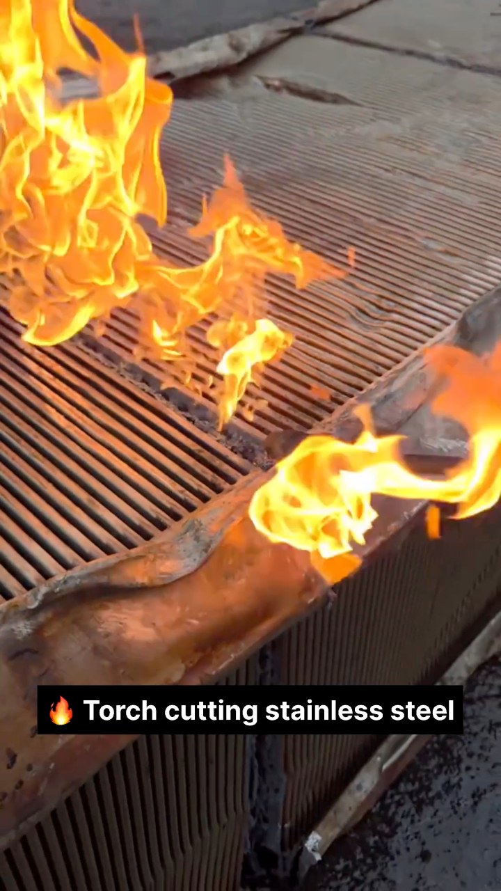 Watch stainless steel being cut with a high-temperature torch. Heavy ...
