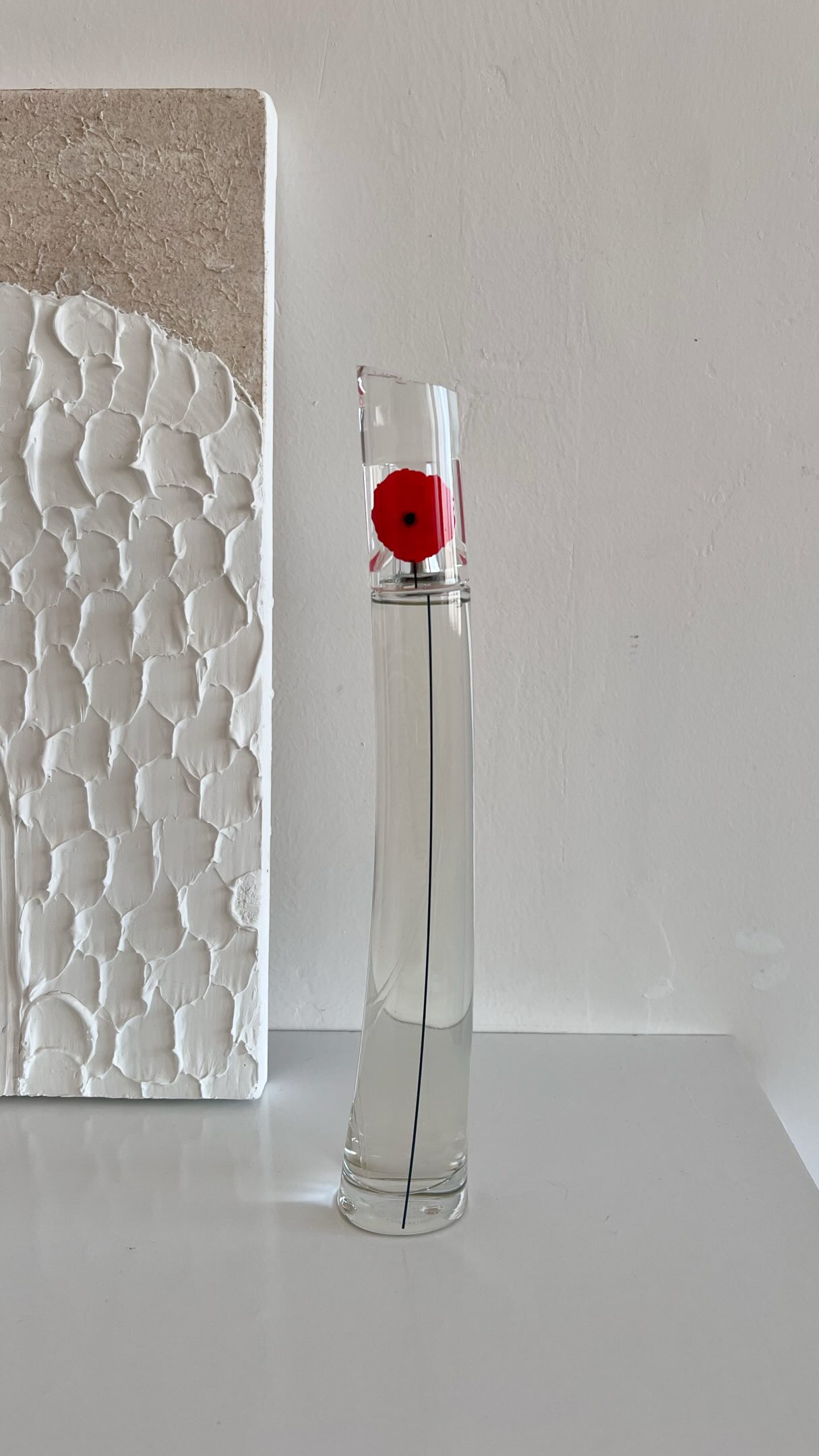 The new FLOWER BY KENZO L'Absolue Eau de Parfum bottle captures