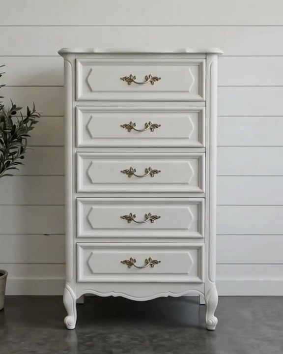 This stunning, solid wood French Provincial chest by Henry Link