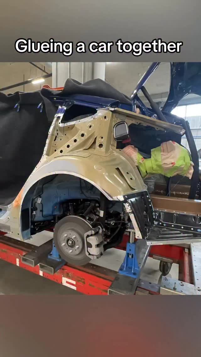 Glueing this 1/4 panel onto a Tesla model 3. This car got hit hard on ...
