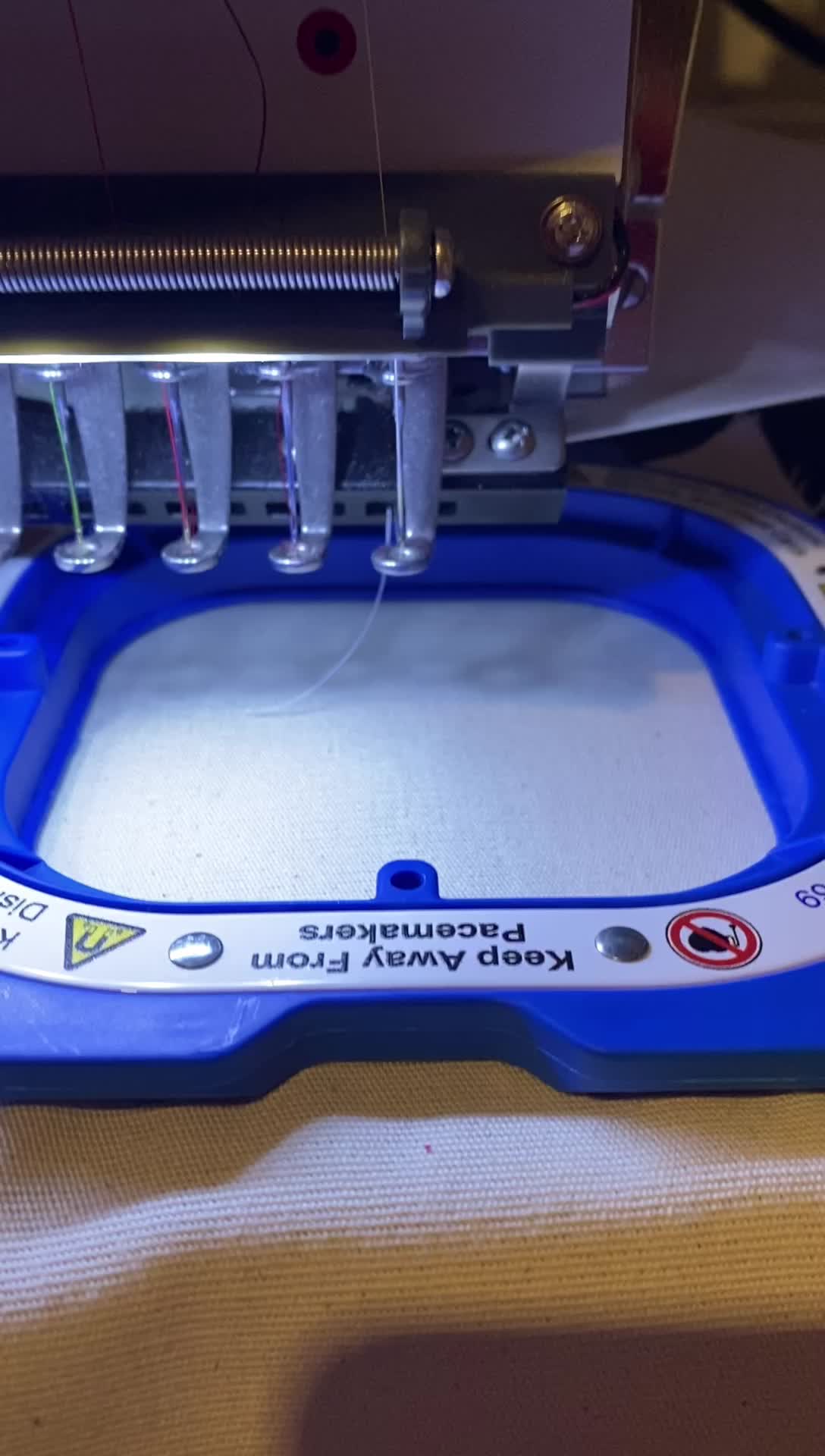 Merrow style border on embroidery machine | Badge work demonstrating a ...