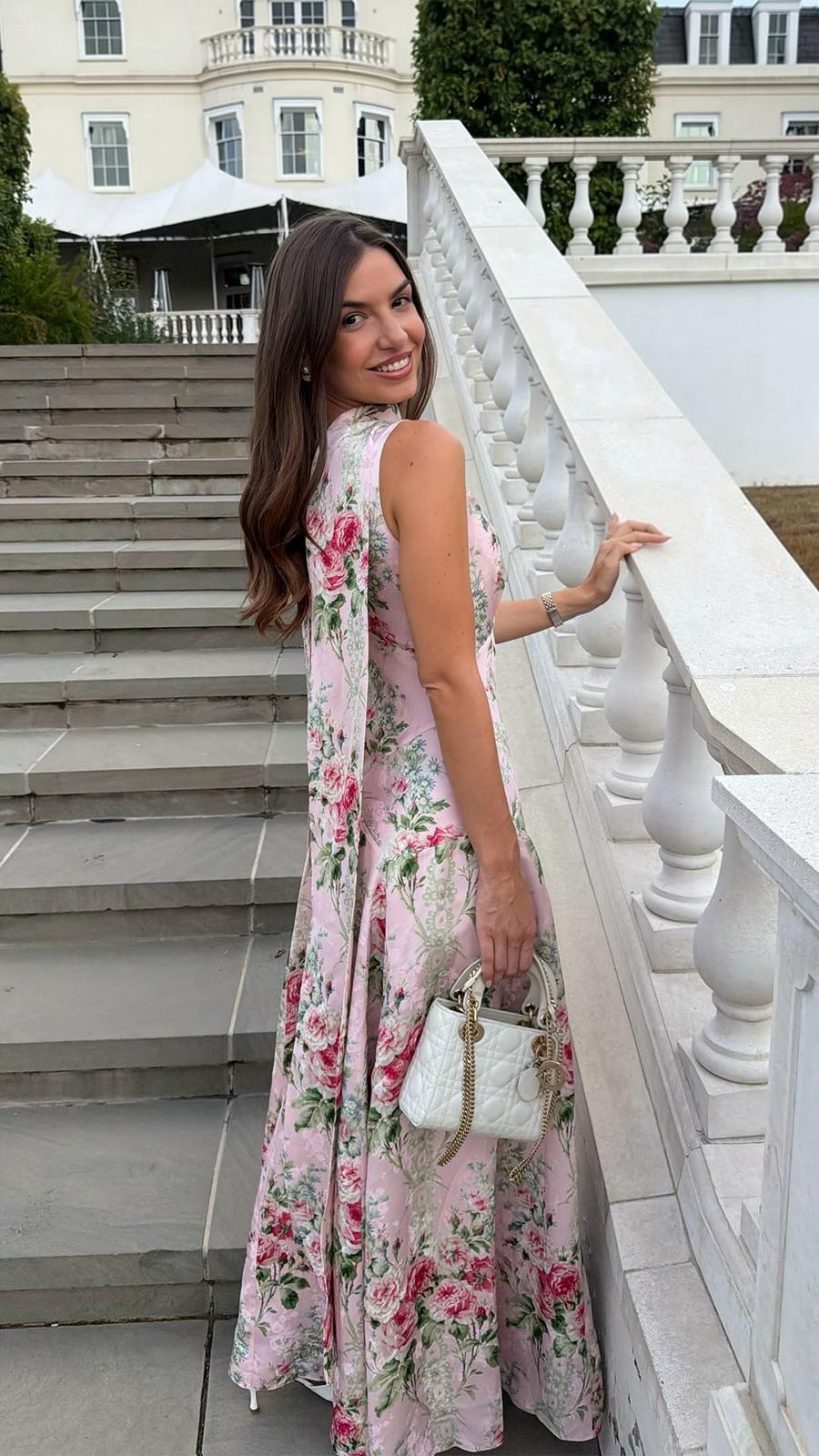 sofie mini dress in hot pink solace london This autumn, florals take centre stage ✨🌸@sophielouisesdiary wears the Palace Garden Gown, showcasing an artful archival-inspired print across luxurious jacquard, with a flattering V-neckline, defined Elina mini