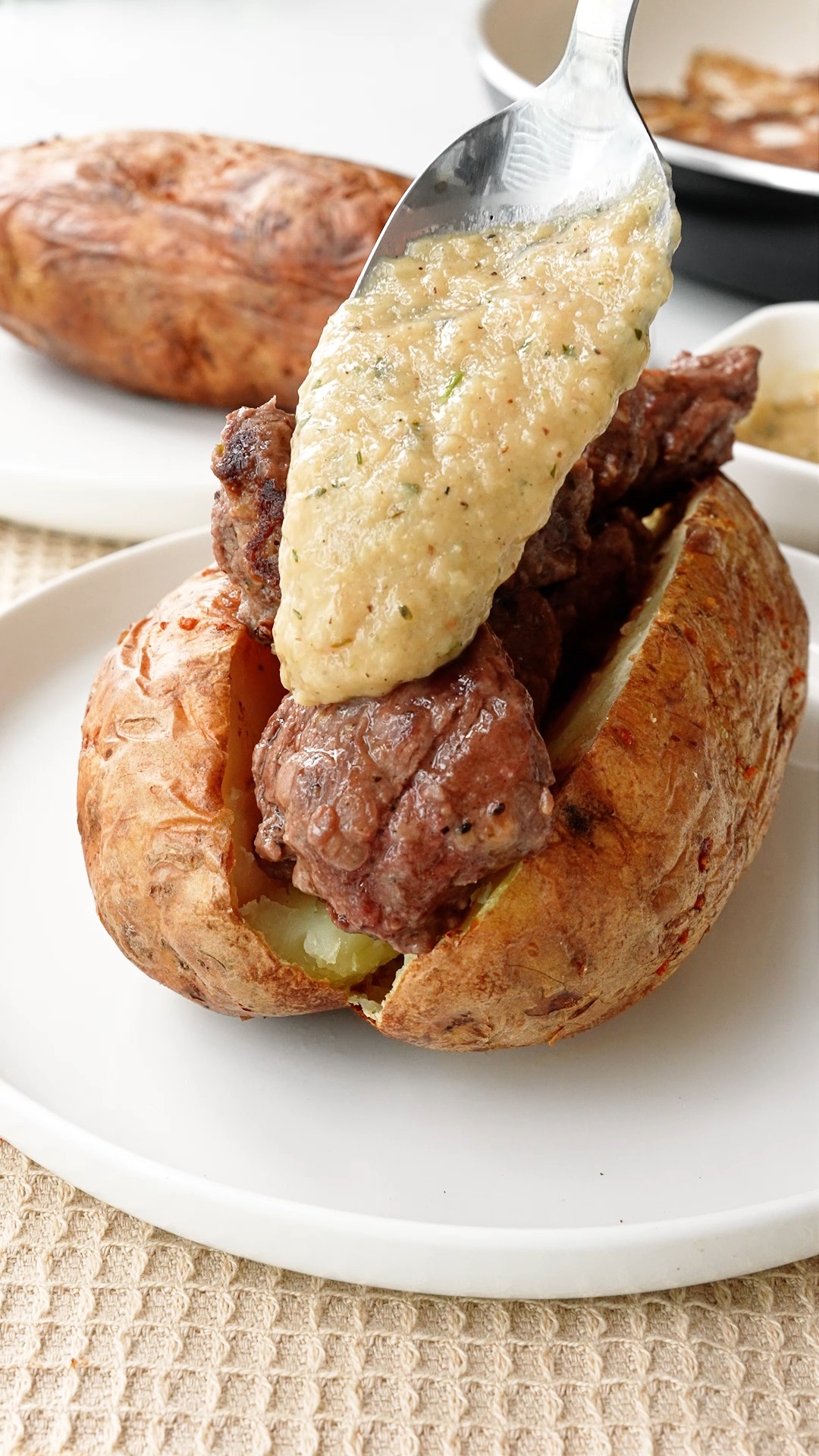 Elevate your next baked potato with tender garlic and herb filet mignon ...