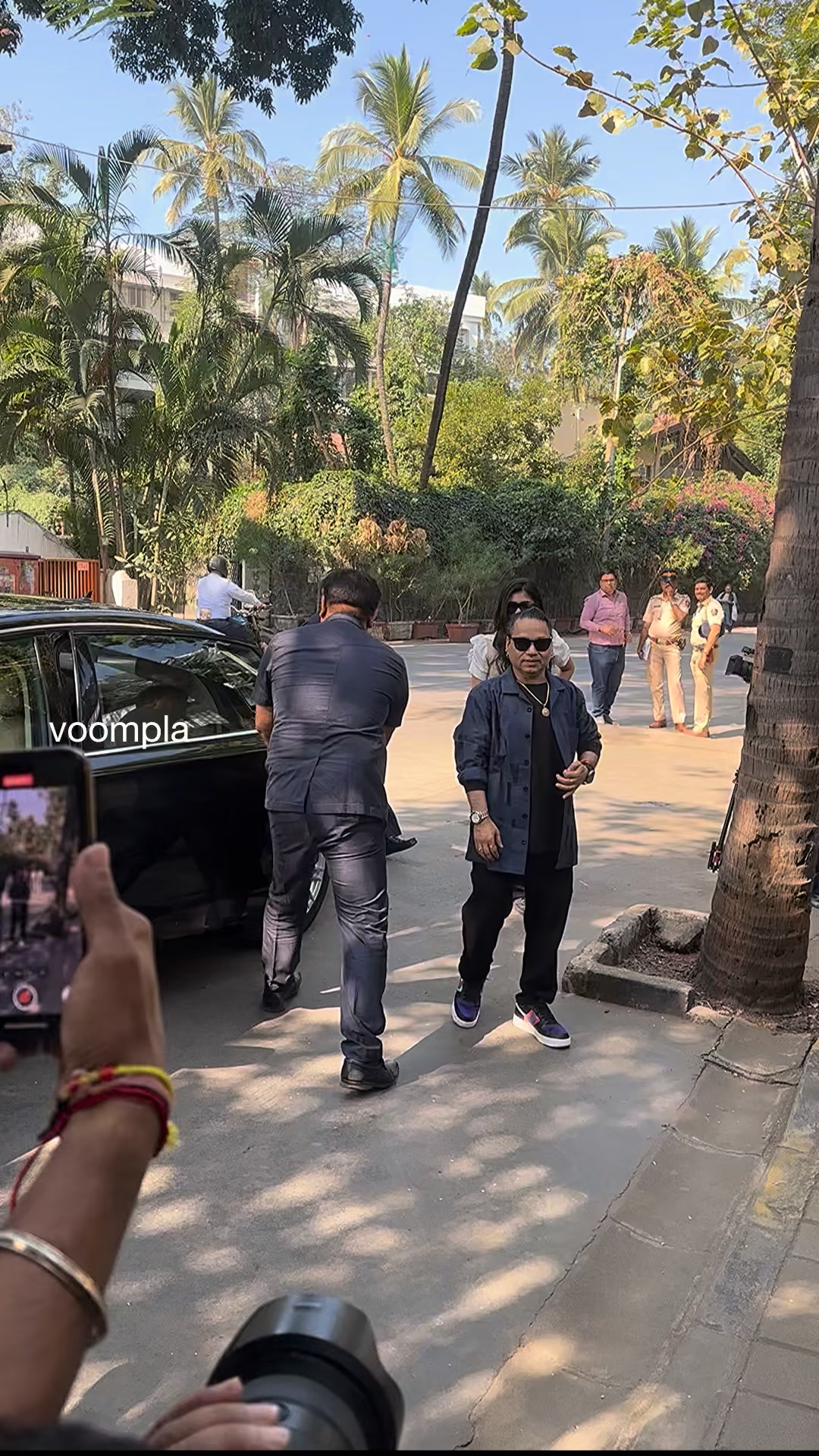 kailash kher arrives to cast his vote as he steps out and about ...