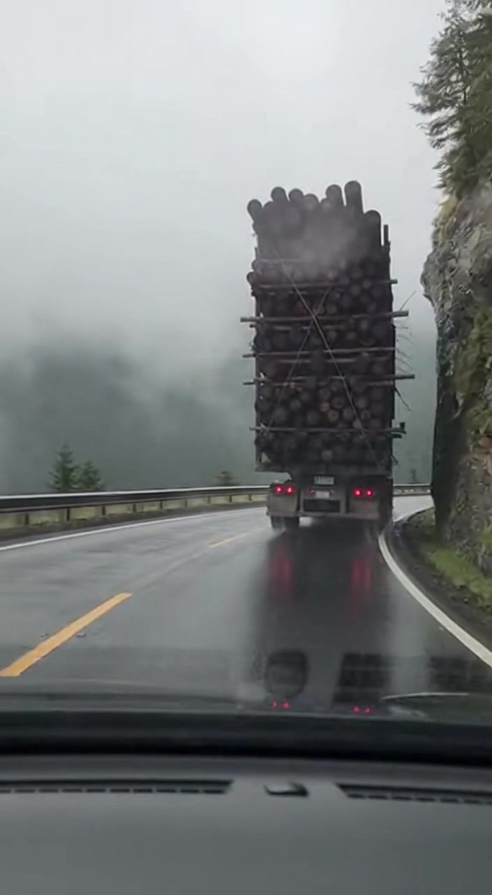 Log Truck Tips on Cliffside Curve After Clipping Rock Wall Coos County ...