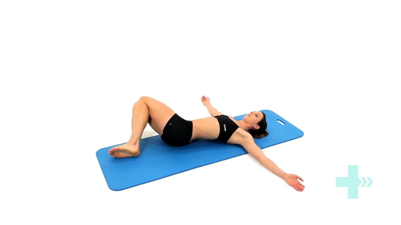 Lower trunk rotation Lie on your back with your knees bent and your ...