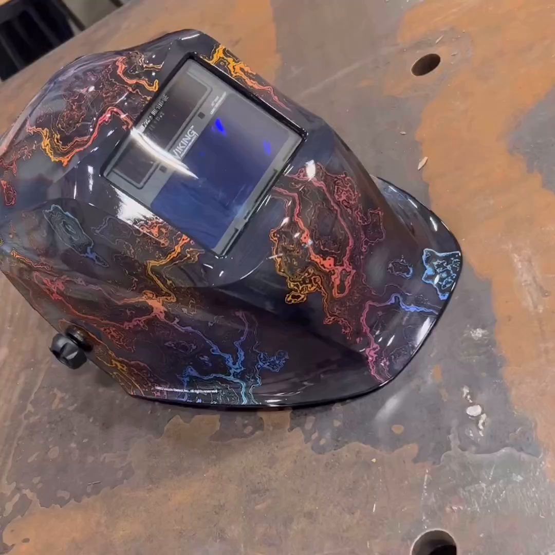 This VIKING 1840 Tempered Welding Helmet with beautiful oil-slick