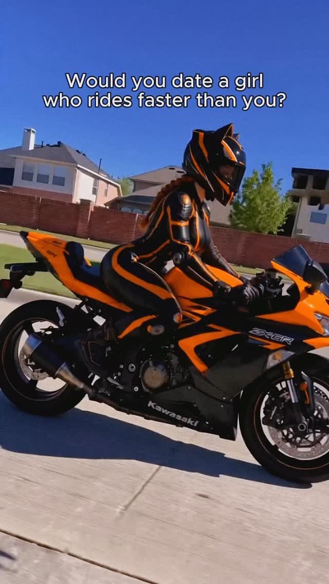 Pink skies, a matching helmet, and a custom Hello Kitty sportbike