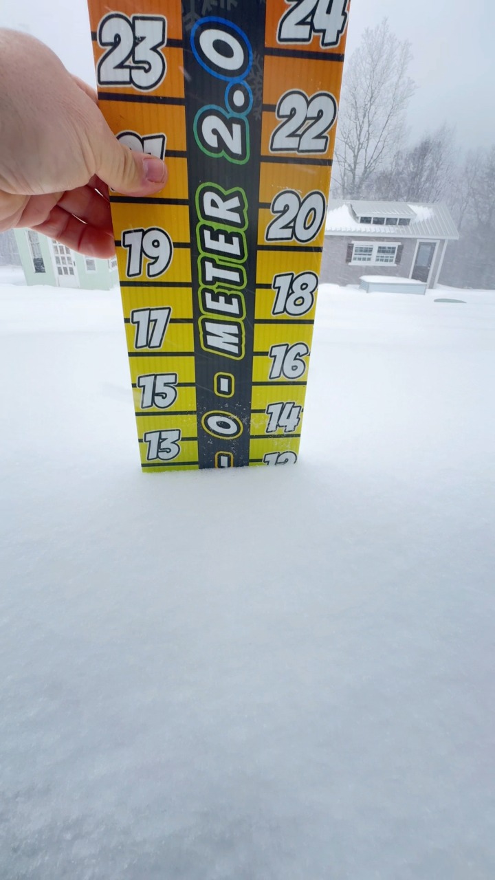 Checking the snow depth in Holmes County Ohio and feeding the birds ...