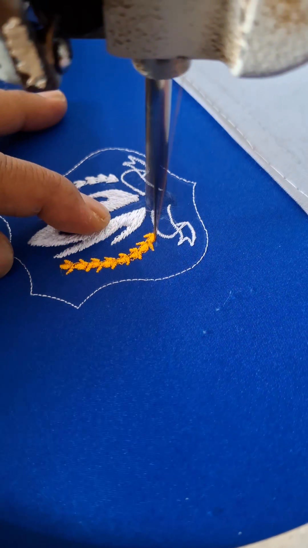 the process of embroidering a logo with a manual machine #embroidery # ...