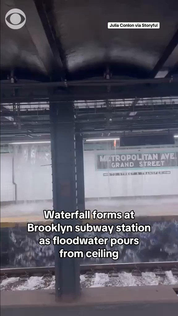 Floodwater poured inside a Brooklyn subway station and formed a ...