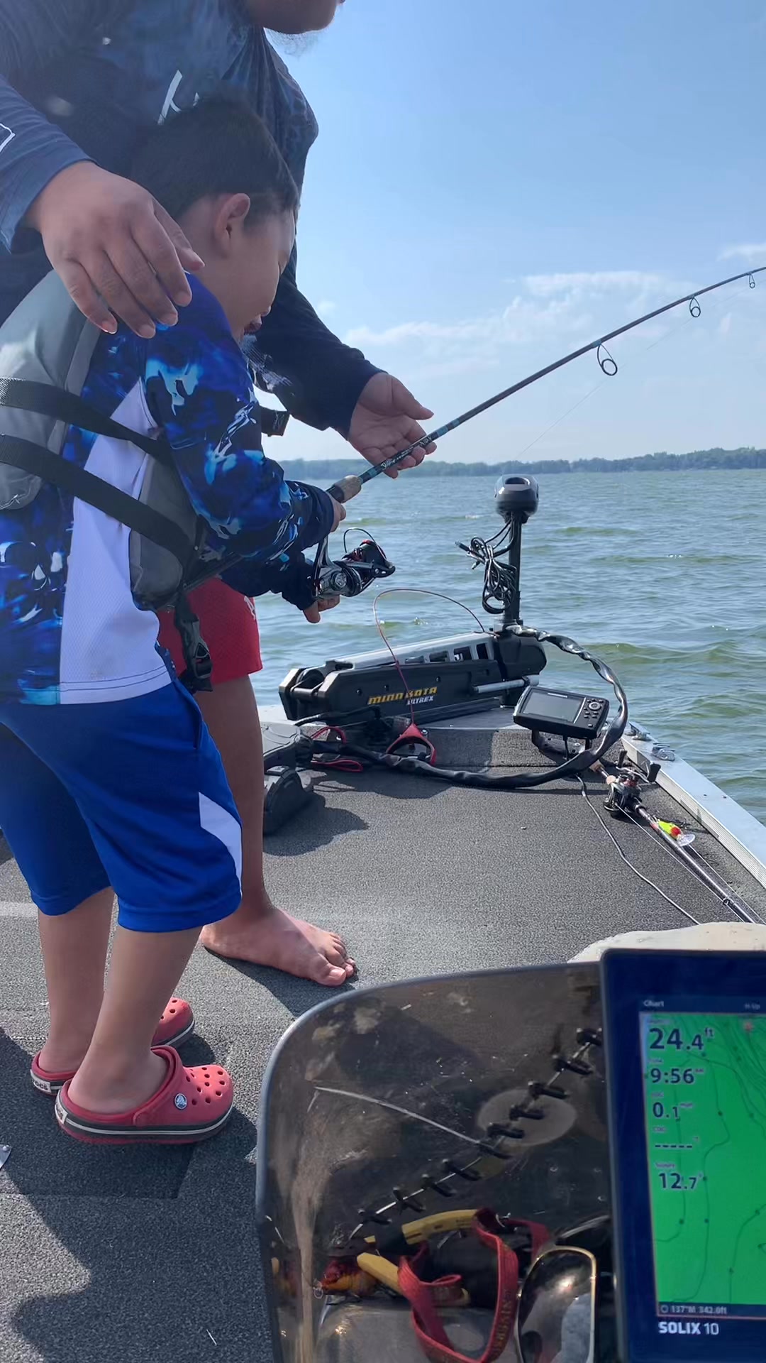boy holding fishing reel and rodreel Spining Reels Rod Combos (2-Pack), 5-Foot 6-Inch 2-Piece Fishing Pole, Size 2000 Reels, Pre-Spooled with 10 lb and 15 lb Mono Line5FT/1.5M : Sports & Outdoors 6 year old catches fish