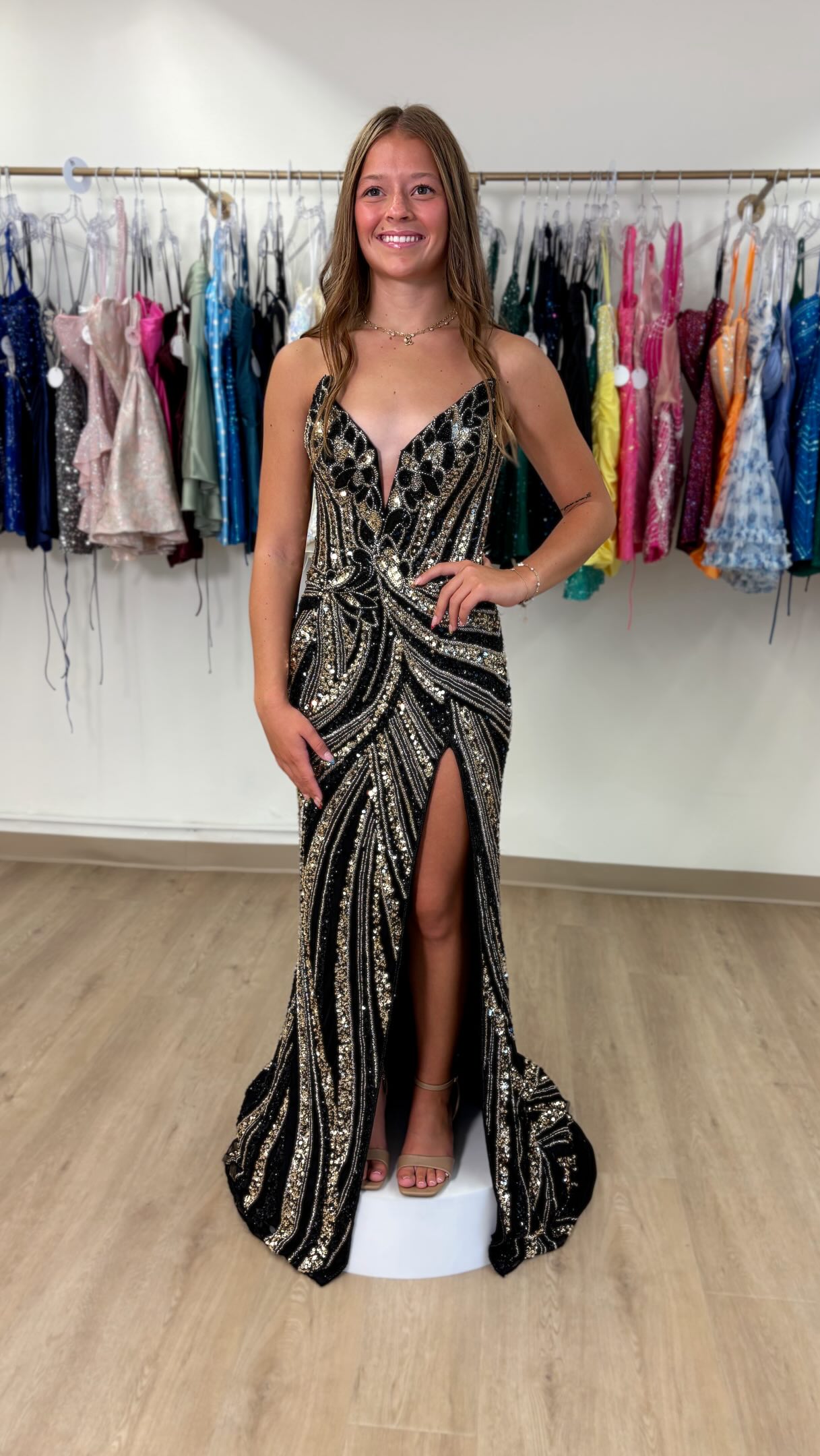 This black and gold gown is a must try for homecoming or prom this year ✨, #hausofivory #siouxcityia #homecomingdress #promdress #siouxland , haus of ivory bridal co • sioux city homecoming dress shop 