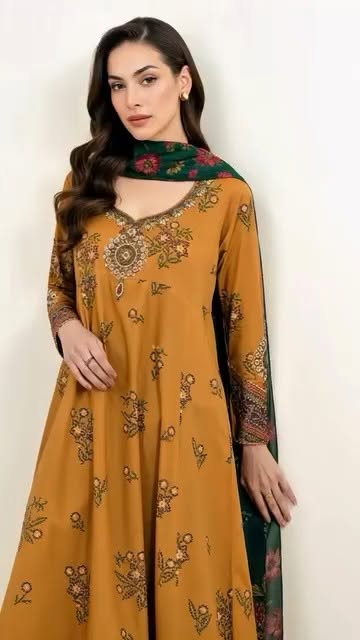 online ladies dress shopping in bangladesh 𝐄𝐦𝐛𝐫𝐨𝐢𝐝𝐞𝐫𝐞𝐝 𝟑 𝐏𝐢𝐞𝐜𝐞 𝐋𝐚𝐰𝐧 𝐒𝐮𝐢𝐭, A vibrant rust ensemble with delicate embroidery, a teal green chiffon dupatta, and comfortable cotton trousers—perfect for effortless summer style., Shop Now : lwd: midi