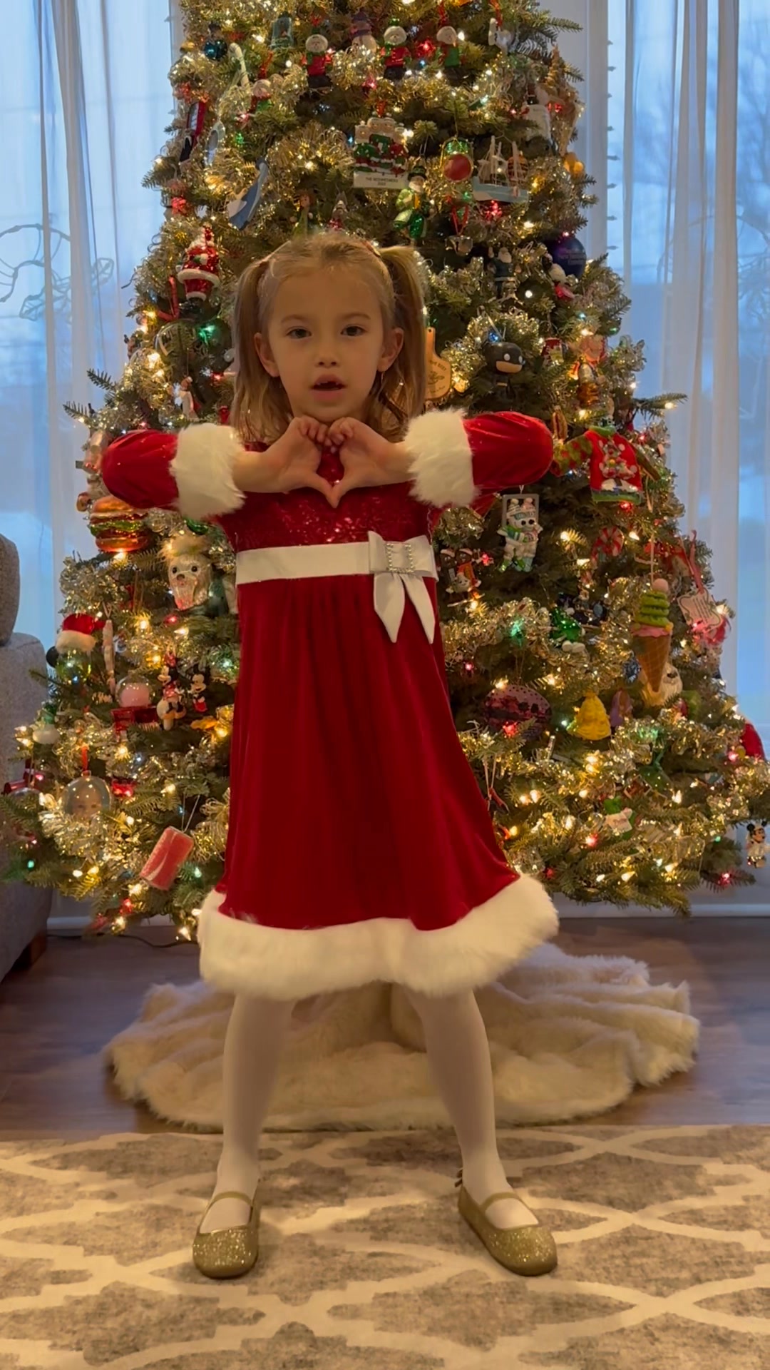 She’s been practicing this song for weeks waiting for her other front tooth to come out. She couldn’t wait to put on her Christmas dress and sing it | Colleen Schrack Reinheimer
