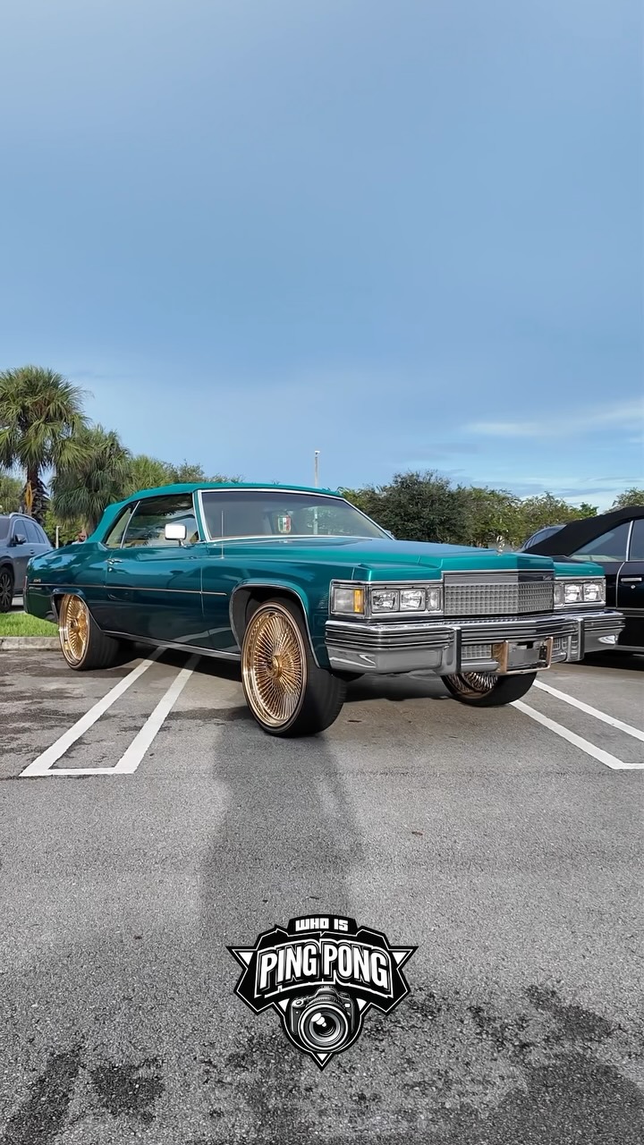 Kandy teal cadillac le cabriolet on gold Dayton wire wheels