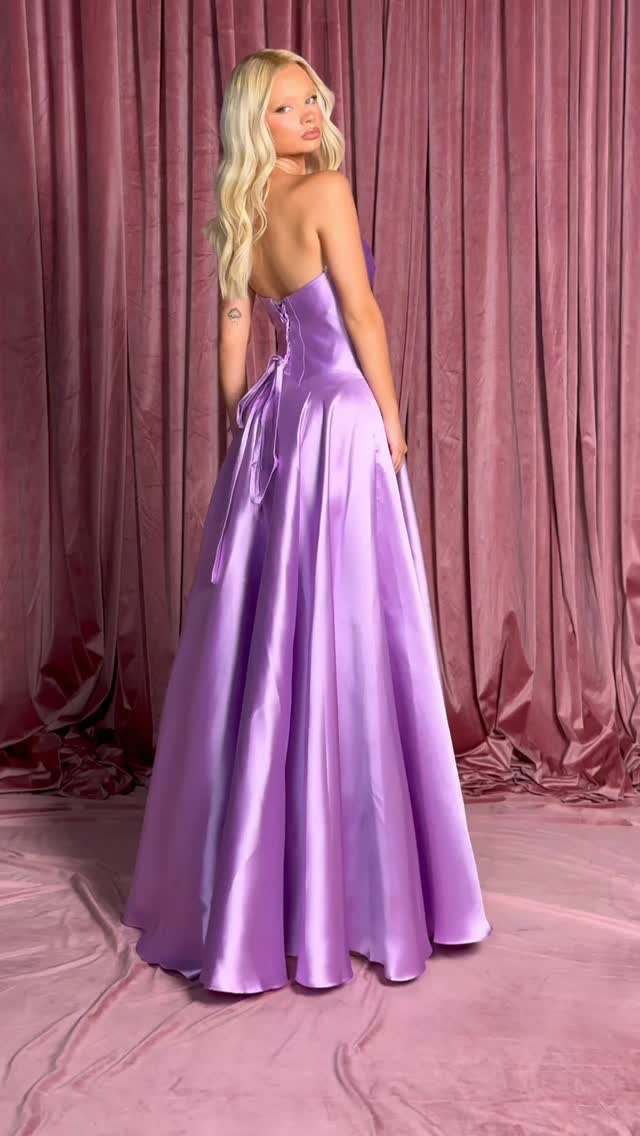 ✨ SCHOOL FORMAL SEASON IS HERE ✨, Make an entrance in this dreamy lilac satin gown 💜 Perfect for school formal, with a statement silhouette, flattering corset-style bodice and gorgeous full skirt., 📍 