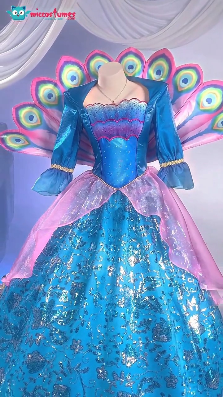 That tail isn’t going anywhere, we’ll show you exactly how to attach it, and it's easier than you think. See for yourself! 😉, 🛒https://miccostumes.com/Barbara-Princess-Rosella-Blue-Dress-Cosplay-Costu