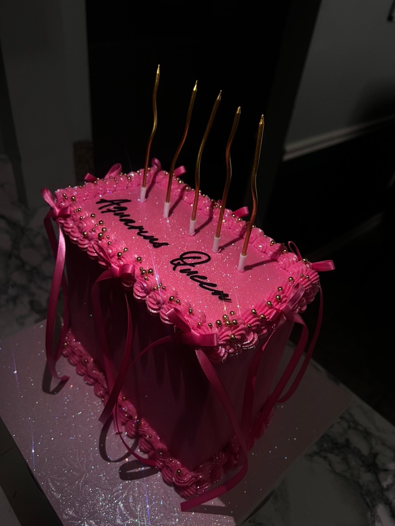 Pink rectangle glitter cake with the cute bows for an Aquarius Queen ...