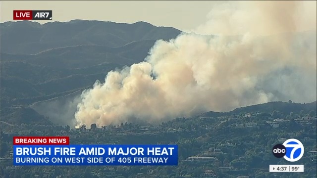 BREAKING NOW: Brush fire is burning off 405 Freeway near the Getty