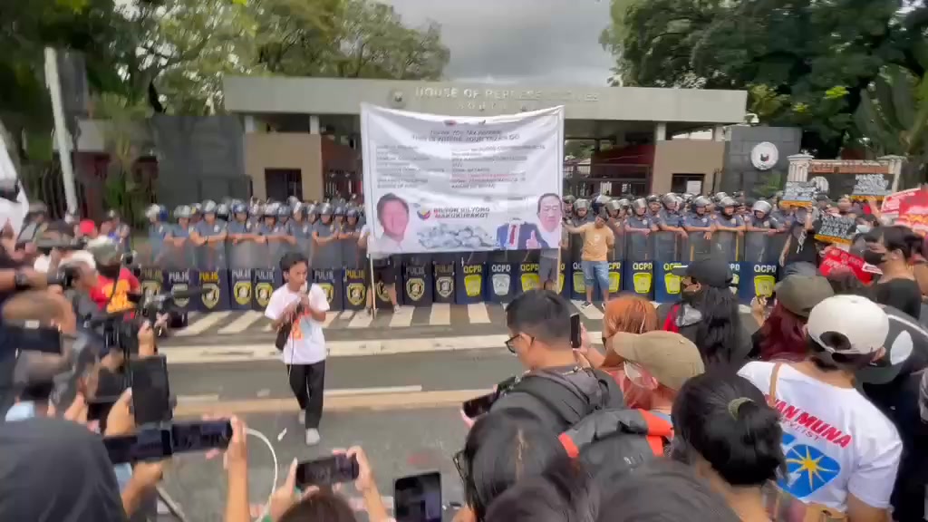 Members of various progressive groups, together with flood victims ...