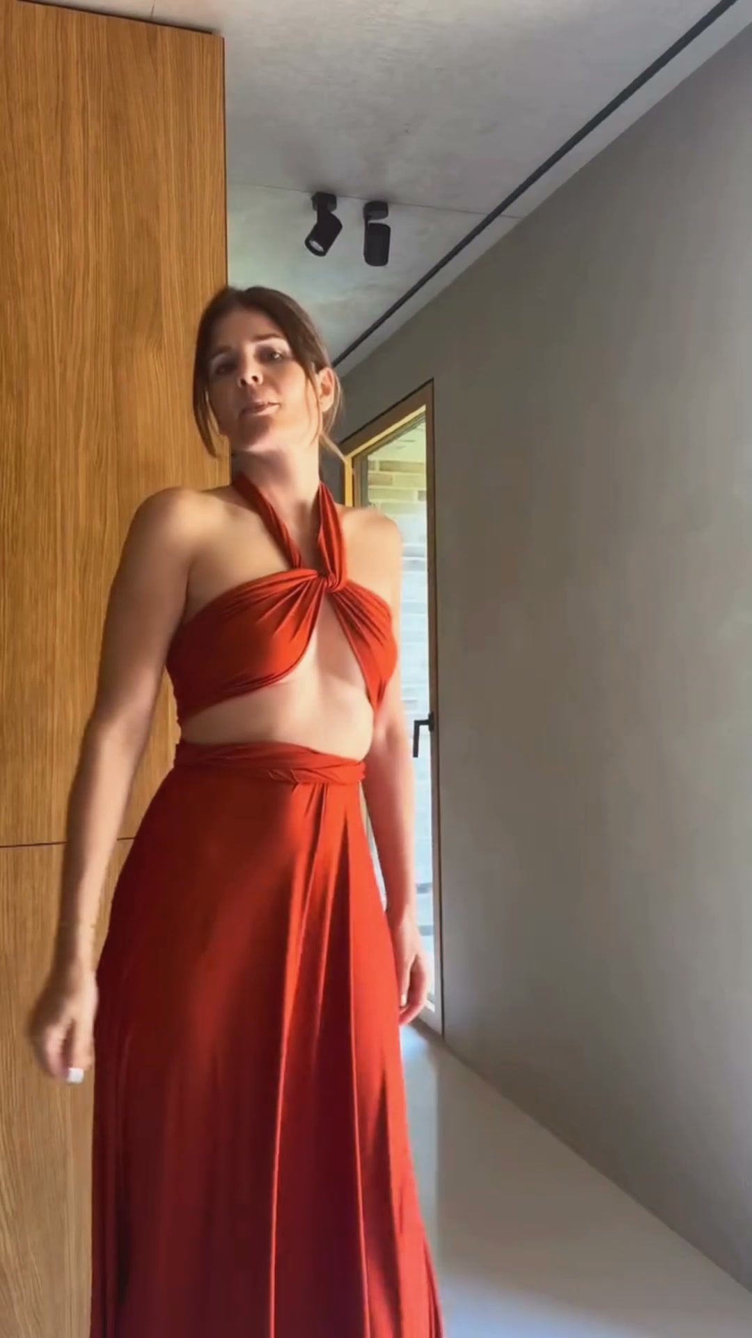 Invited to a wedding and don’t know what to wear? 🤔, Maybe you need… an Infinity Dress. ✨, Featuring our Burnt Orange Infinity Dress 🧡, One dress, endless ways to style it for every special moment., 