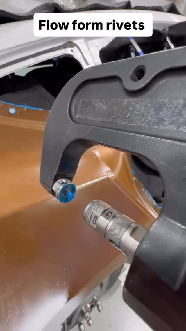 Some flow form rivets being installed on this quarter panel replacement ...