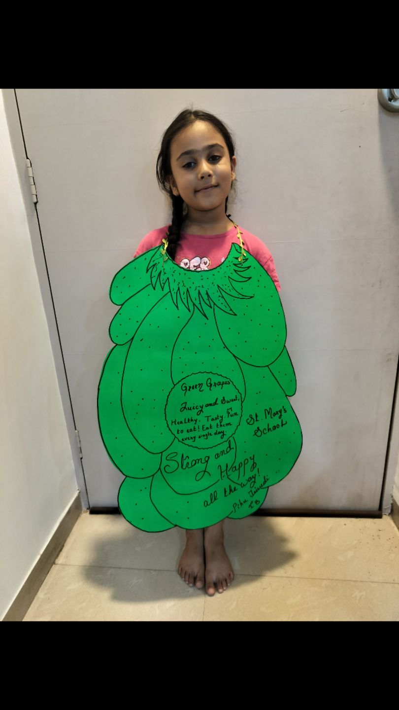 green grapes fancy dress Day Celebration at School 💚🍇, Our little Pihu dressed as sweet and spread smiles everywhere. So proud of you, my little star! 🌟💚, Green Day Celebration, Grapes Costume, School Activity, ladies pleated dress